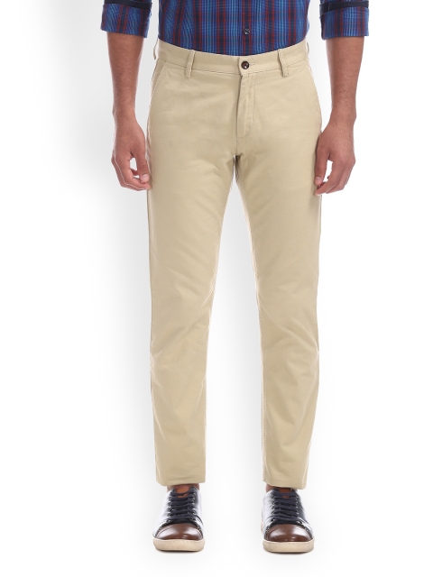 

Arrow Sport Men Beige Slim Fit Solid Regular Trousers