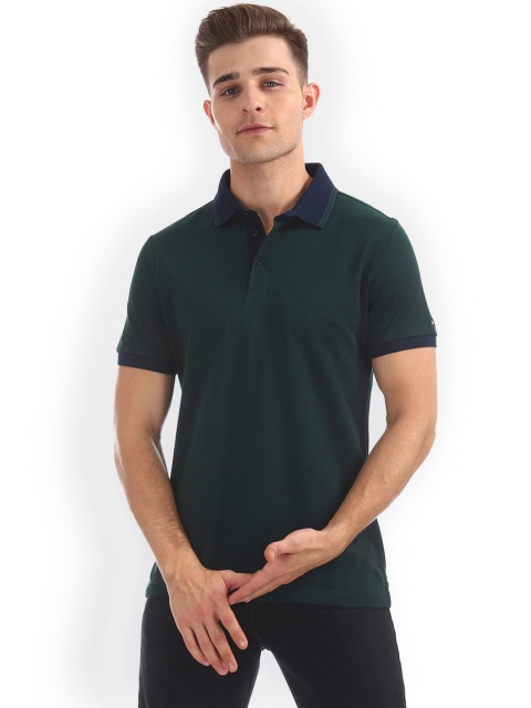 

Arrow Sport Men Green Solid Polo Collar T-shirt