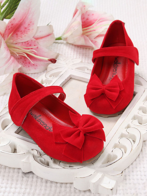 

Walktrendy Girls Red Solid Ballerinas