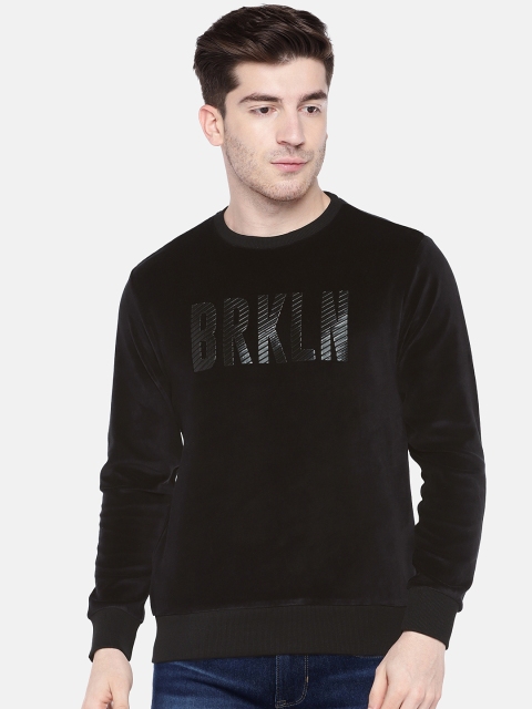 

People Men Black Solid Sweatshirt