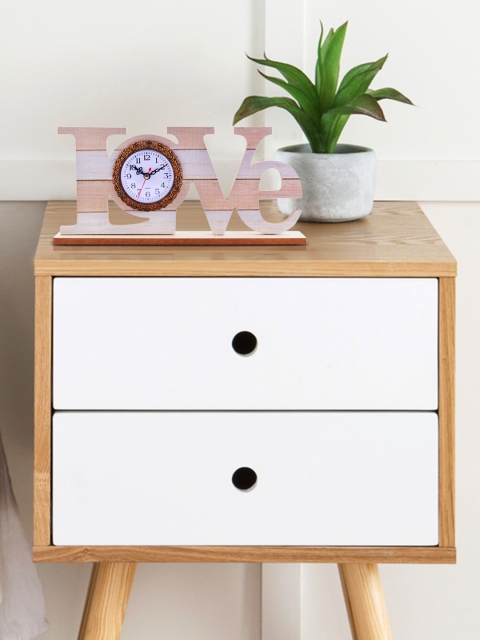 

Archies White Quirky Solid Analogue Table Clock