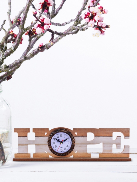 

Archies White Quirky Solid Analogue Table Clock