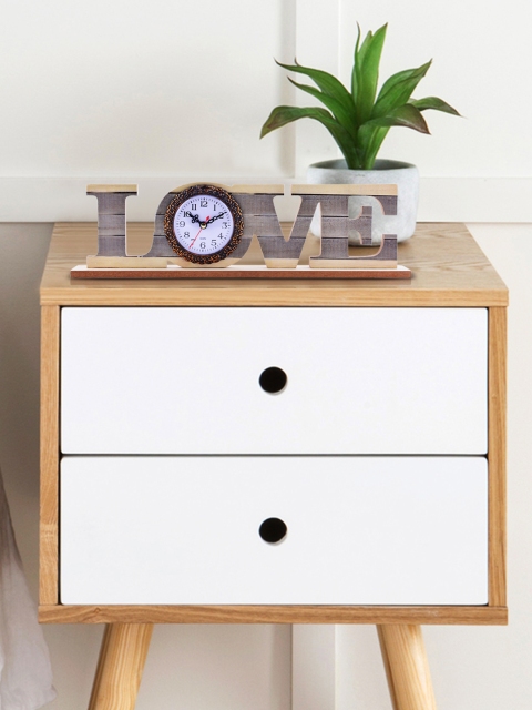 

Archies White Quirky Solid Analogue Table Clock