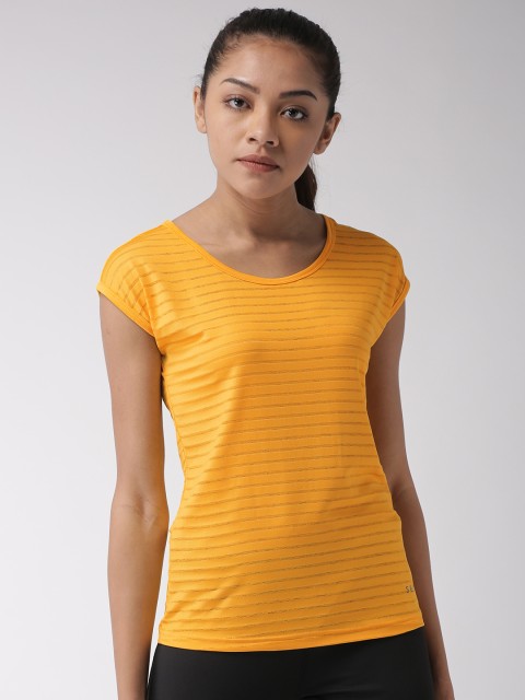 

SEVEN by MS Dhoni Women Mustard Self Design Round Neck T-shirt