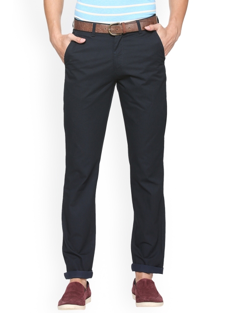 

Peter England Men Blue Slim Fit Self Design Regular Trousers