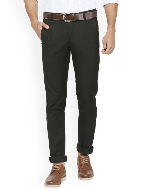 

Van Heusen Sport Men Black Slim Fit Solid Regular Trousers