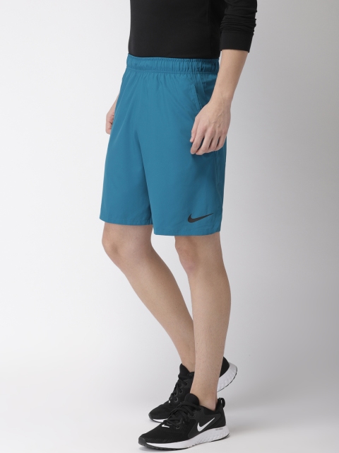 

Nike Men Blue Solid Regular Fit Sports Shorts
