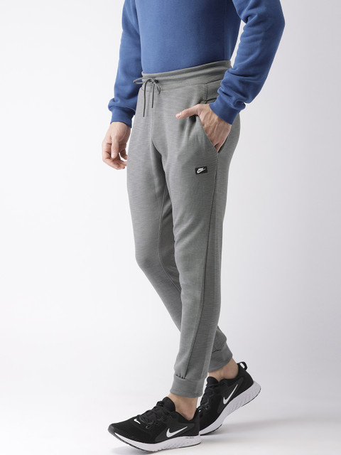 

Nike Men Grey Solid Standard Fit OPTIC Joggers