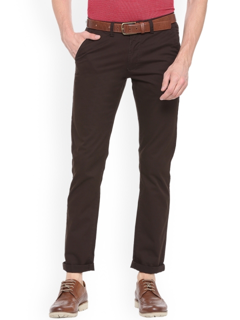 

Peter England Casuals Men Brown Slim Fit Solid Regular Trousers