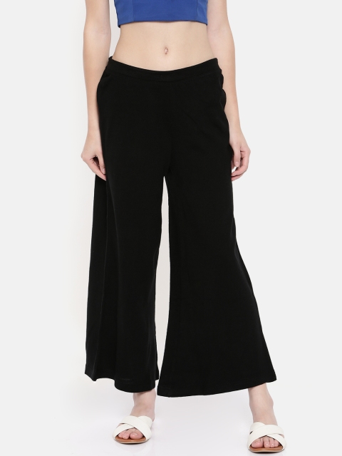 

Melange by Lifestyle Women Black Solid Flared Palazzos