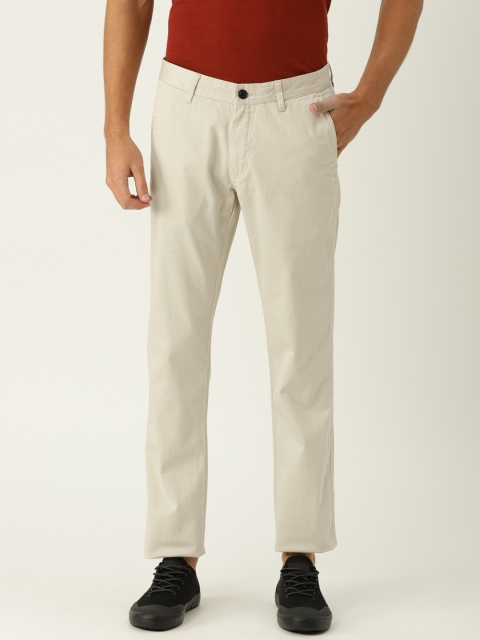 

Van Heusen Sport Men Beige Slim Fit Solid Regular Trousers