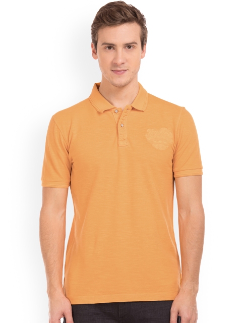 

Arrow Blue Jean Co. Men Orange Solid Polo Collar T-shirt