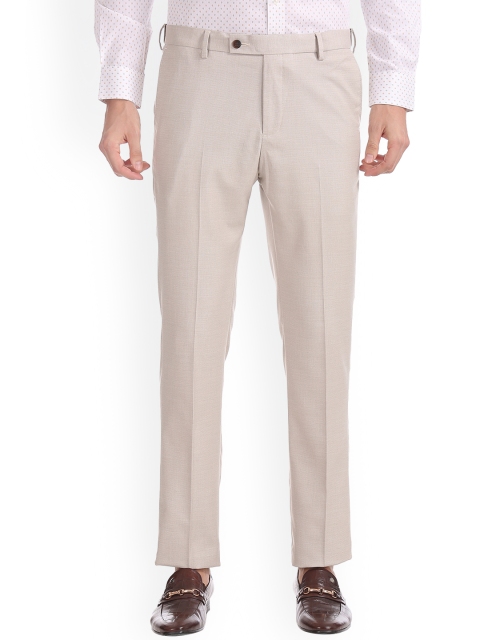 

Arrow Men Beige Tapered Fit Self Design Formal Trousers
