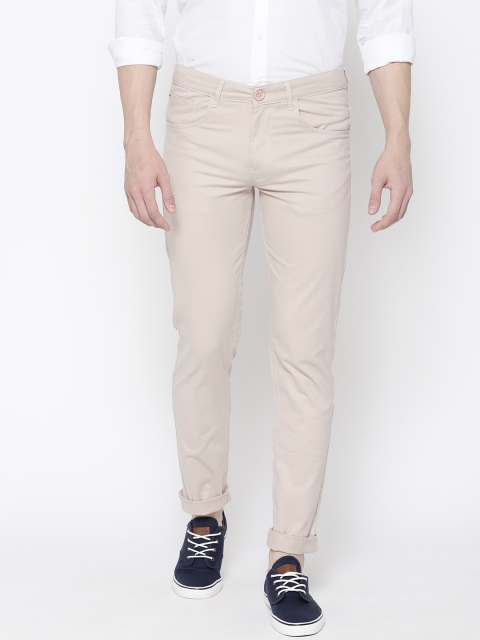 

SPYKAR Men Beige Solid Regular Trousers