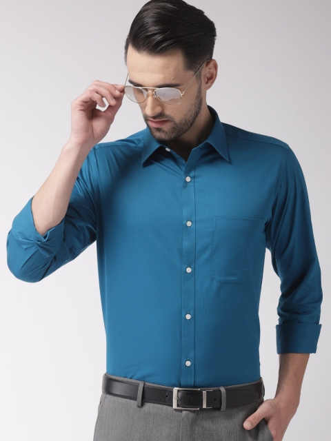 

Raymond Men Blue Slim Fit Solid Formal Shirt