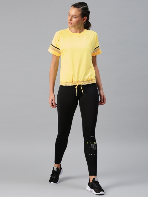 

HRX by Hrithik Roshan Women Yellow Solid Round Neck T-shirt