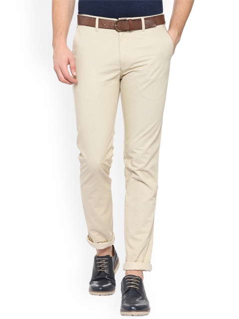 

Peter England Casuals Men Beige Slim Fit Self Design Regular Trousers