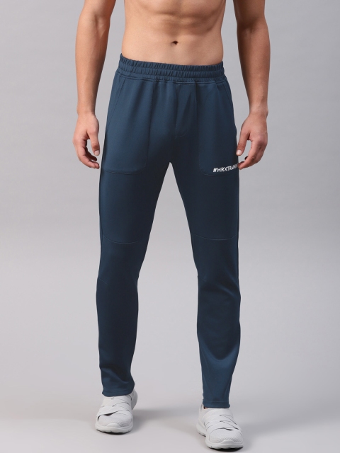 

HRX by Hrithik Roshan Men Training Teal Blue Solid Rapid-Dry Track Pants