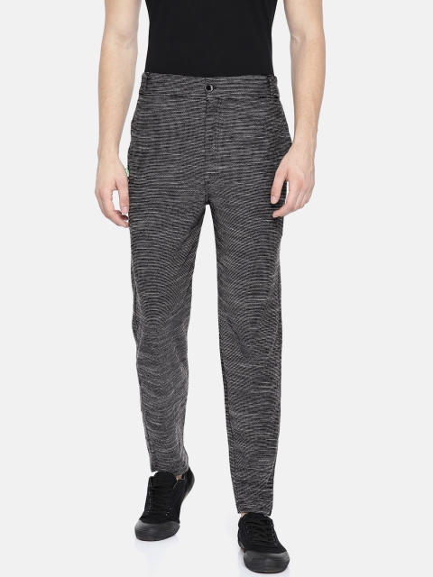

Sports52 wear Men Black & White Self-Design Track Pants