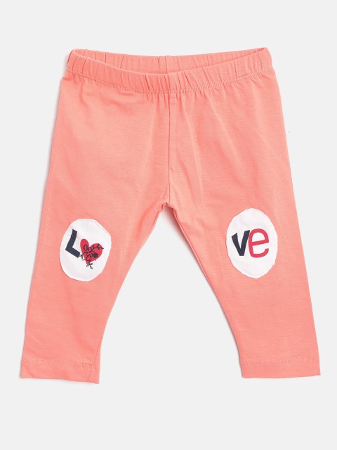 

Gini and Jony Girls Peach-Coloured Solid Leggings with Applique Detail
