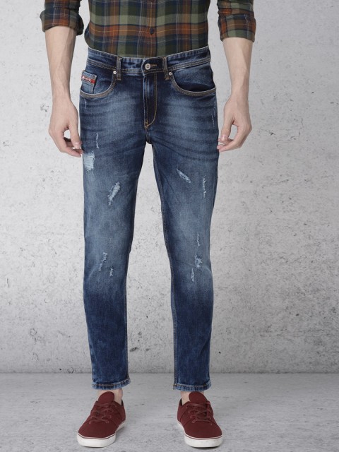 

Ecko Unltd Men Blue Tapered Fit Mid-Rise Mildly-Distressed Jeans