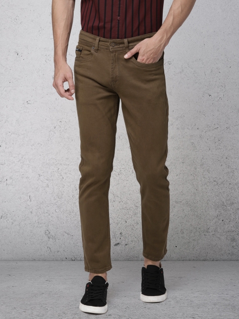 

Ecko Unltd Men Brown Slim Tapered Fit Mid-Rise Clean Look Stretchable Jeans