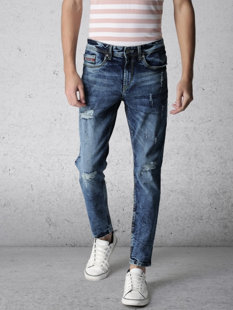 

Ecko Unltd Men Blue Tapered Fit Mid-Rise Low Distress Stretchable Jeans