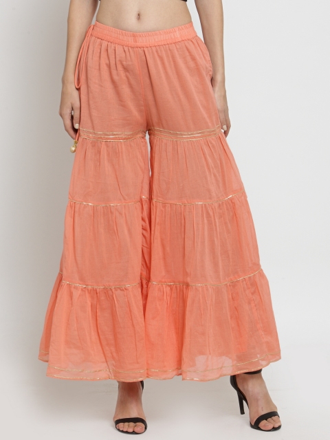 

Laabha Women Peach-Coloured Solid Flared Palazzos