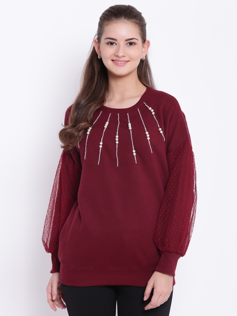 

Texco Women Maroon Self Design Sweatshirt