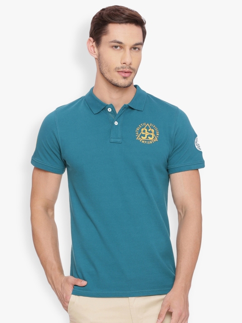 

Basics Men Green Solid Polo Collar T-shirt