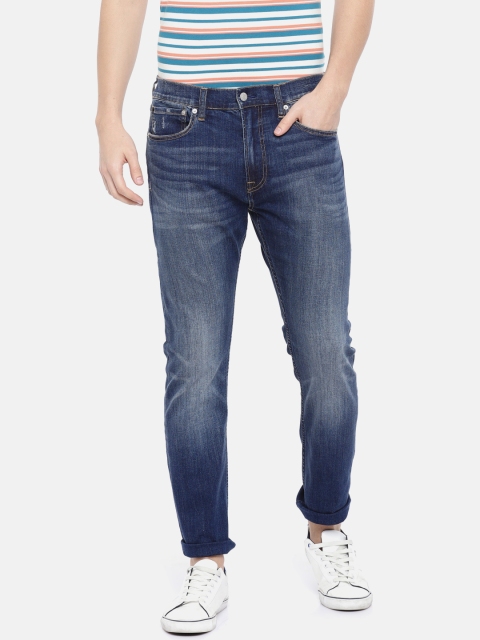 

Calvin Klein Jeans Men Blue Tapered Fit Mid-Rise Low Distress Stretchable Jeans