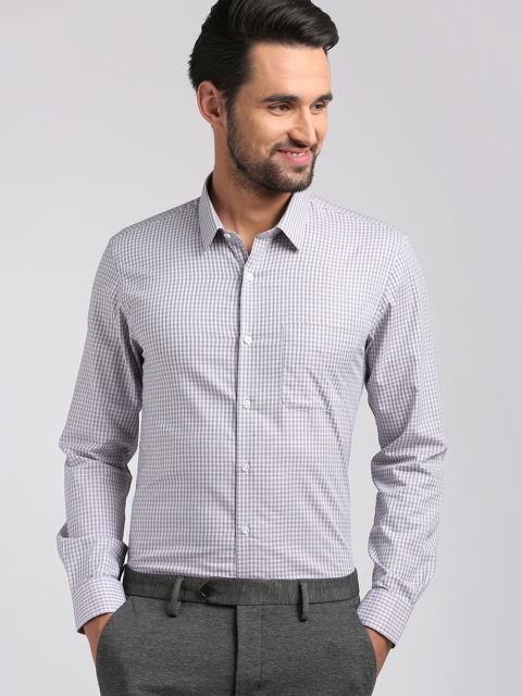 

Peter England Men White Slim Fit Solid Casual Shirt