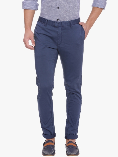 

Basics Men Navy Blue Tapered Fit Self Design Chinos