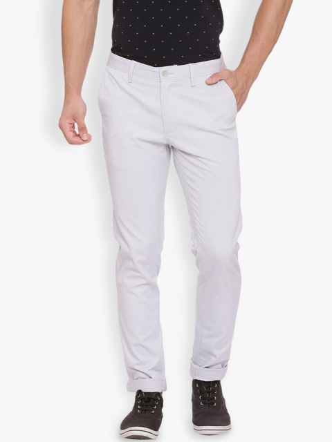 

Basics Men Off-White Tapered Fit Solid Chinos