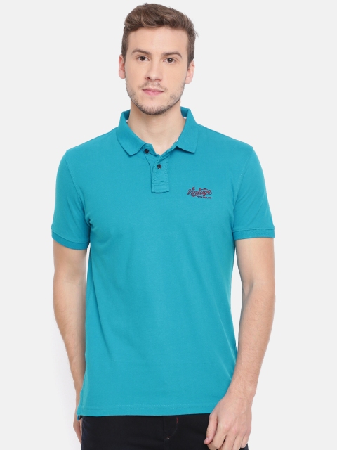 

Peter England Casuals Men Blue Solid Polo Collar T-shirt