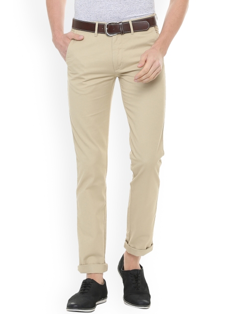 

Peter England Casuals Men Beige Slim Fit Solid Regular Trousers