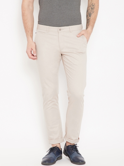 

Blackberrys Men Beige Tapered Fit Solid Trousers