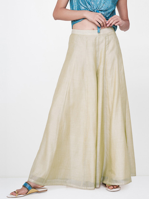 

Global Desi Women Beige Solid Flared Palazzos