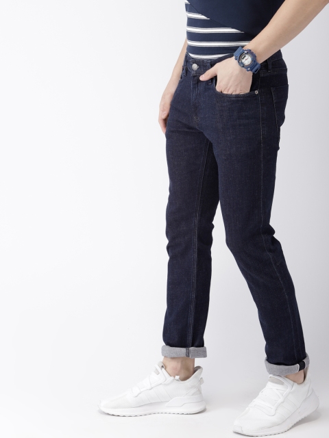 

Tommy Hilfiger Men Blue Scanton Slim Fit Mid-Rise Clean Look Stretchable Jeans