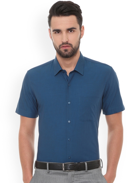 

Peter England Men Blue Solid Slim Fit Casual Shirt