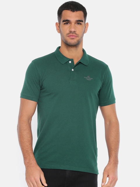 

Peter England Men Green Solid Polo Collar T-shirt