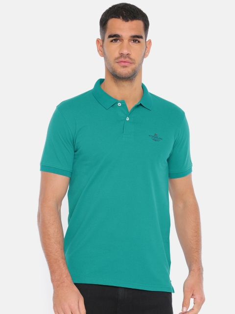 

Peter England Men Teal Solid Polo Collar T-shirt