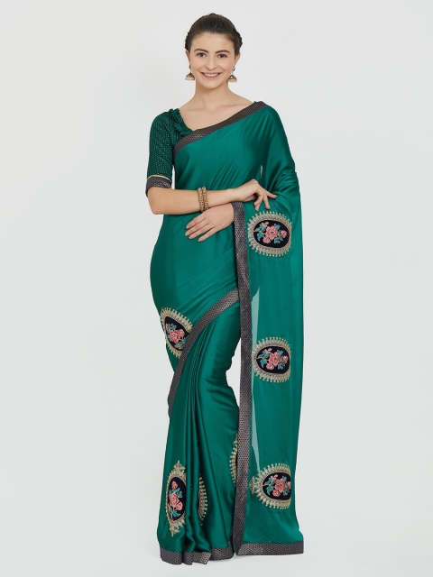 

Indian Women Green & Green Pure Georgette Embroidered Saree