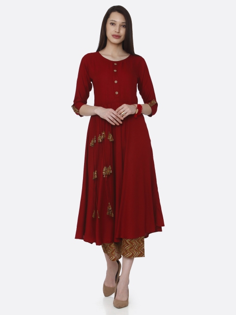 

RAISIN Women Red Solid Kurti with Palazzos
