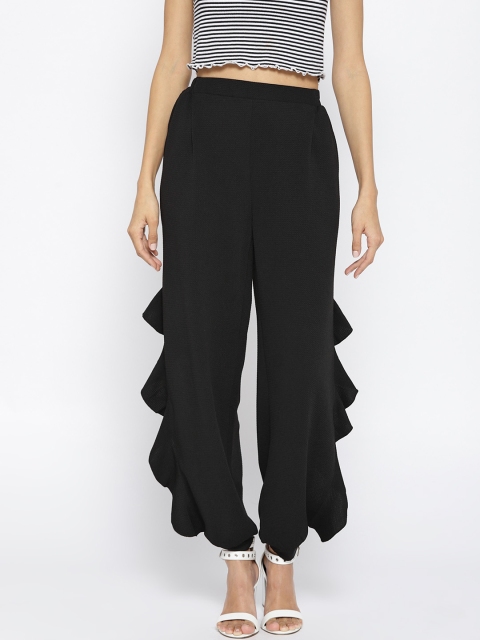 

Miss Bennett Women Black Solid Harem Pants with Ruffle Detail