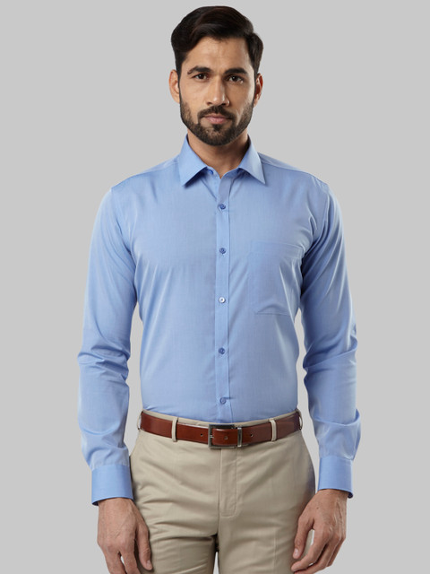 

Raymond Men Blue Regular Fit Solid Formal Shirt