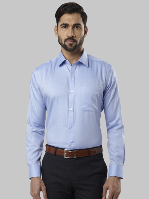

Raymond Men Blue Regular Fit Solid Formal Shirt