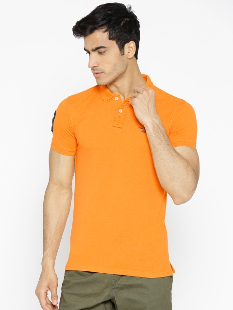 

Peter England Men Orange Solid Polo Collar T-shirt