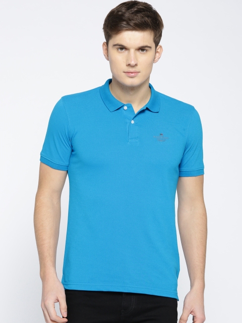 

Peter England Men Blue Solid Polo Collar T-shirt