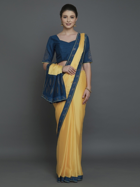 

Mitera Yellow & Teal Poly Georgette Solid Saree